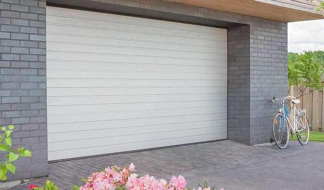 Выбираем ворота в гараж: обзор гаражных секционных ворот RenoMatic